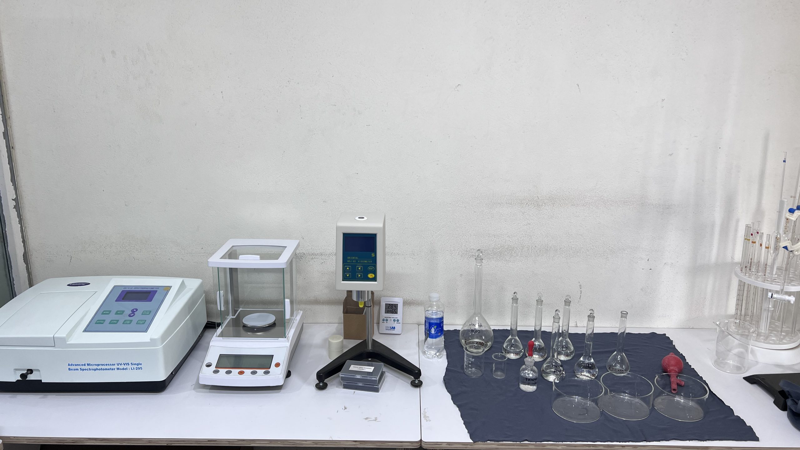 Workbench, Analytical Chemistry Laboratory, including UV-VIS spectrophotometer (left)